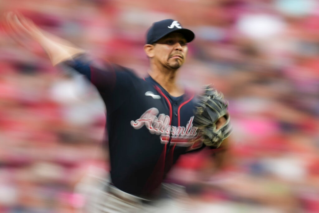 Braves plan roster reshuffle between semi-doubleheader games, considering Carrasco or Camargo for the 27th spot
