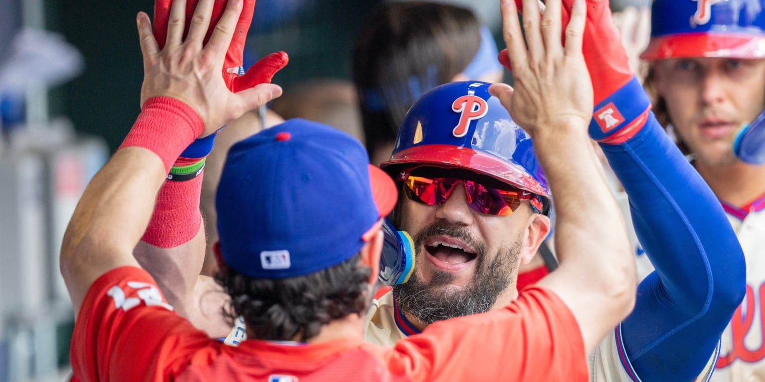 Schwarber and Hill deliver late swings as Phillies win it in 12