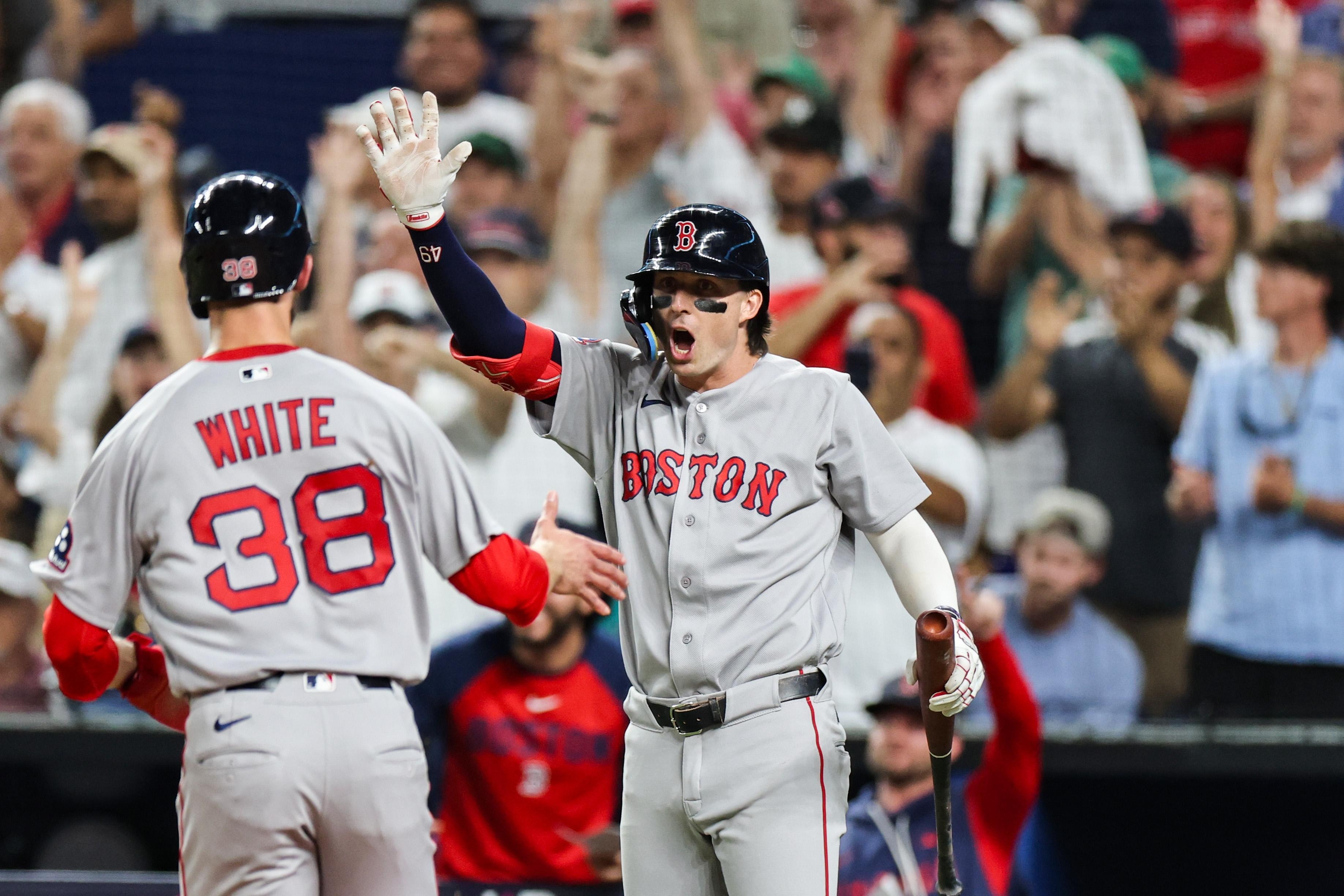 Yankees take a breather as rivals swing into late-game drama, Red Sox rally past Marlins