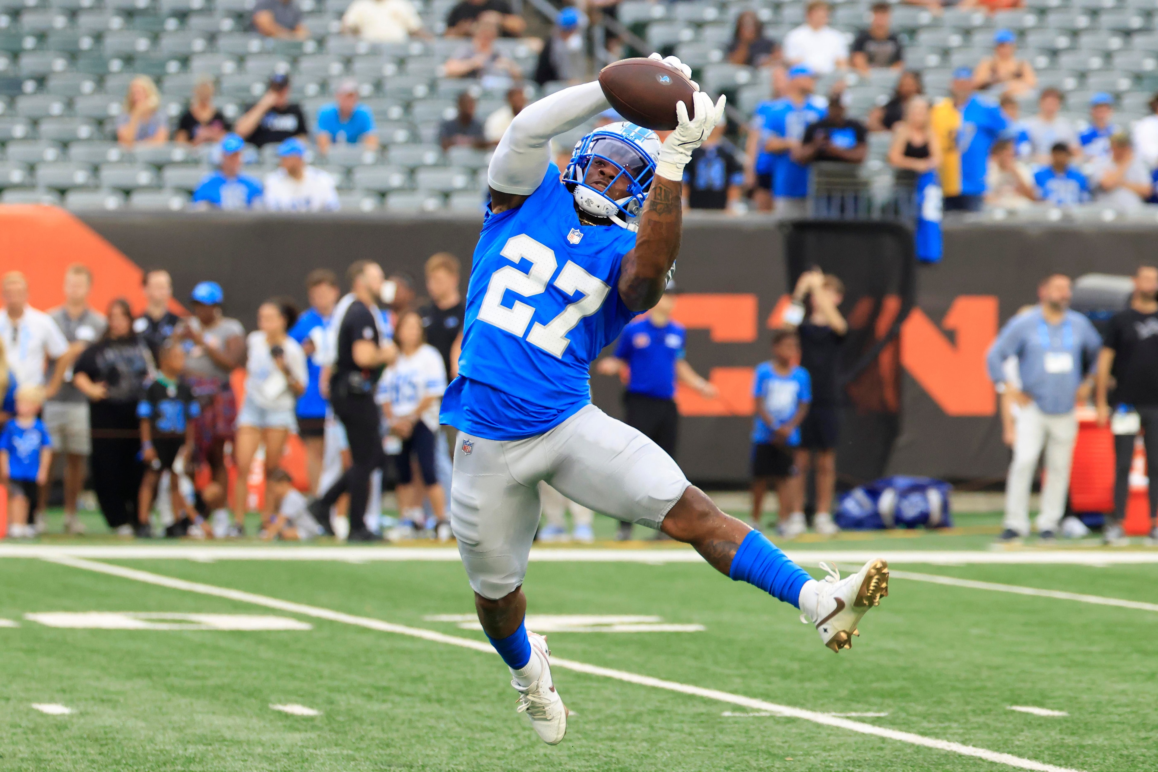 Lions’ Christian Izien is in early concern for season opener, Dan Campbell says