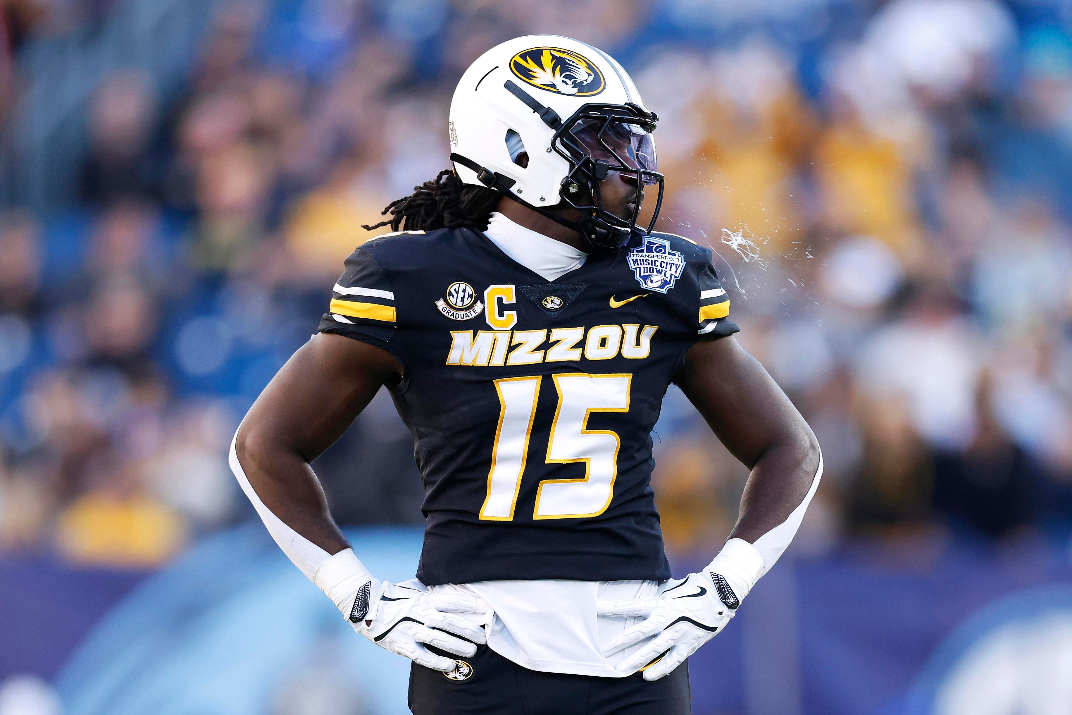 Broncos waive outside linebacker Johnny Walker, trimming depth as roster churn continues