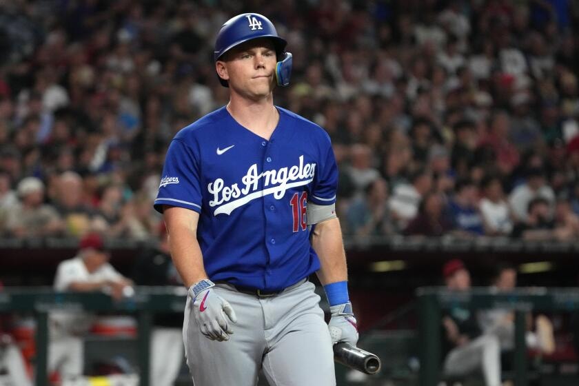 Dodgers map out catcher rotation while Will Smith heals, with Dave Roberts adjusting week-to-week