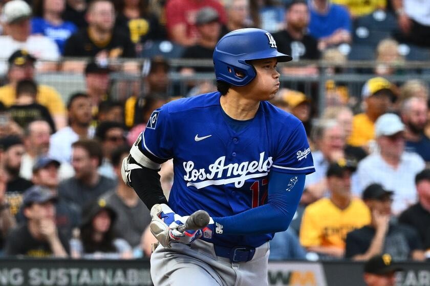 Ohtani leaves early with left-knee inflammation as Dodgers face Pirates