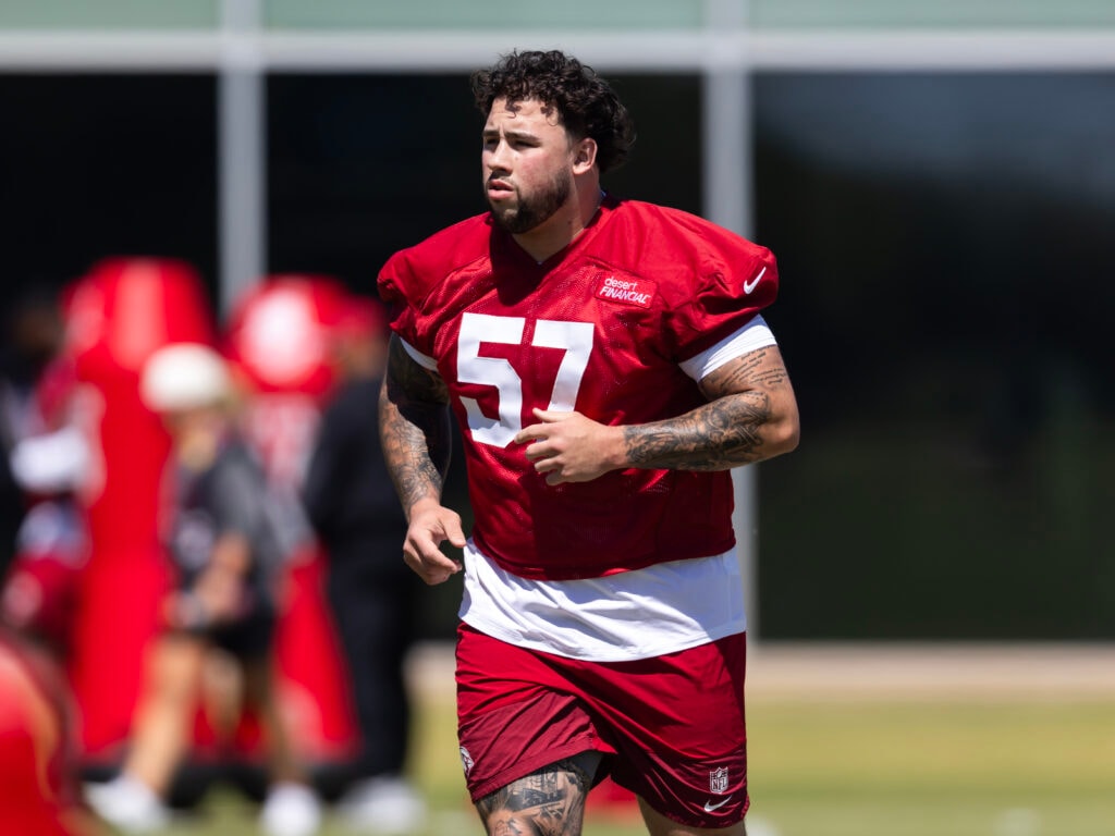 Cardinals rookie guard Chase Bisontis is carted off with knee injury, raising concern for time missed