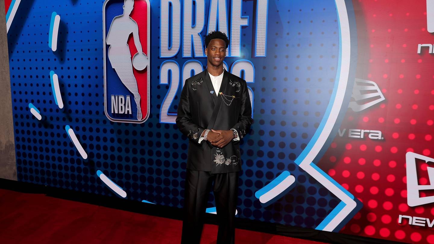 Busting Brackets hands out grades for all 30 picks of the 2026 NBA Draft, with trades and a Miami twist shaping the night