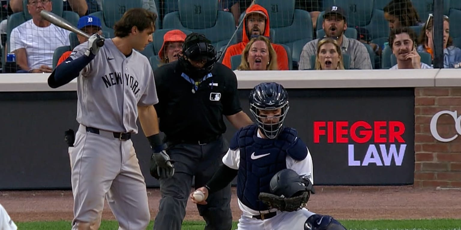 Dillon Dingler’s clean catch job comes with a second job: keeping his eyes on the game while the helmet is behind the plate