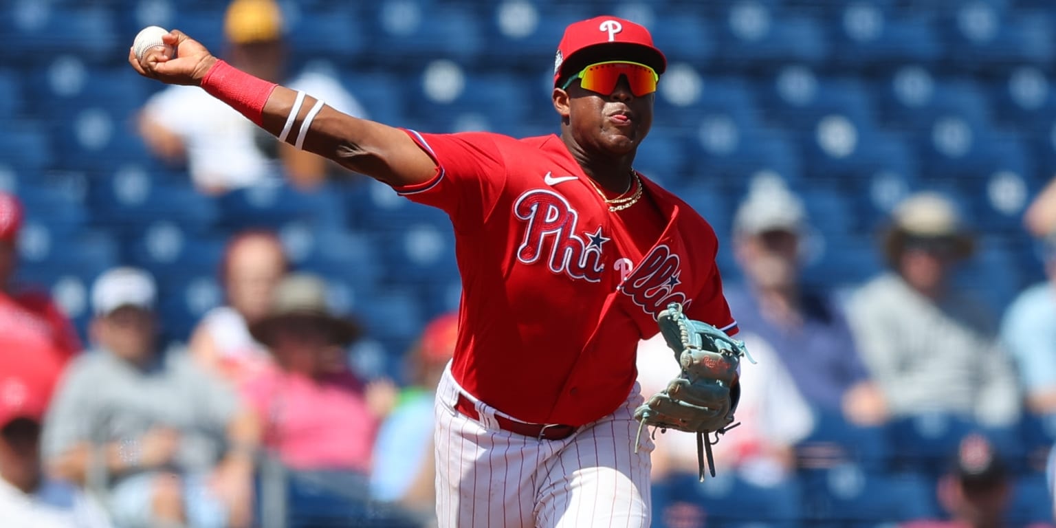Phillies Double-A prospect Aroon Escobar makes the play, then throws his glove to complete it