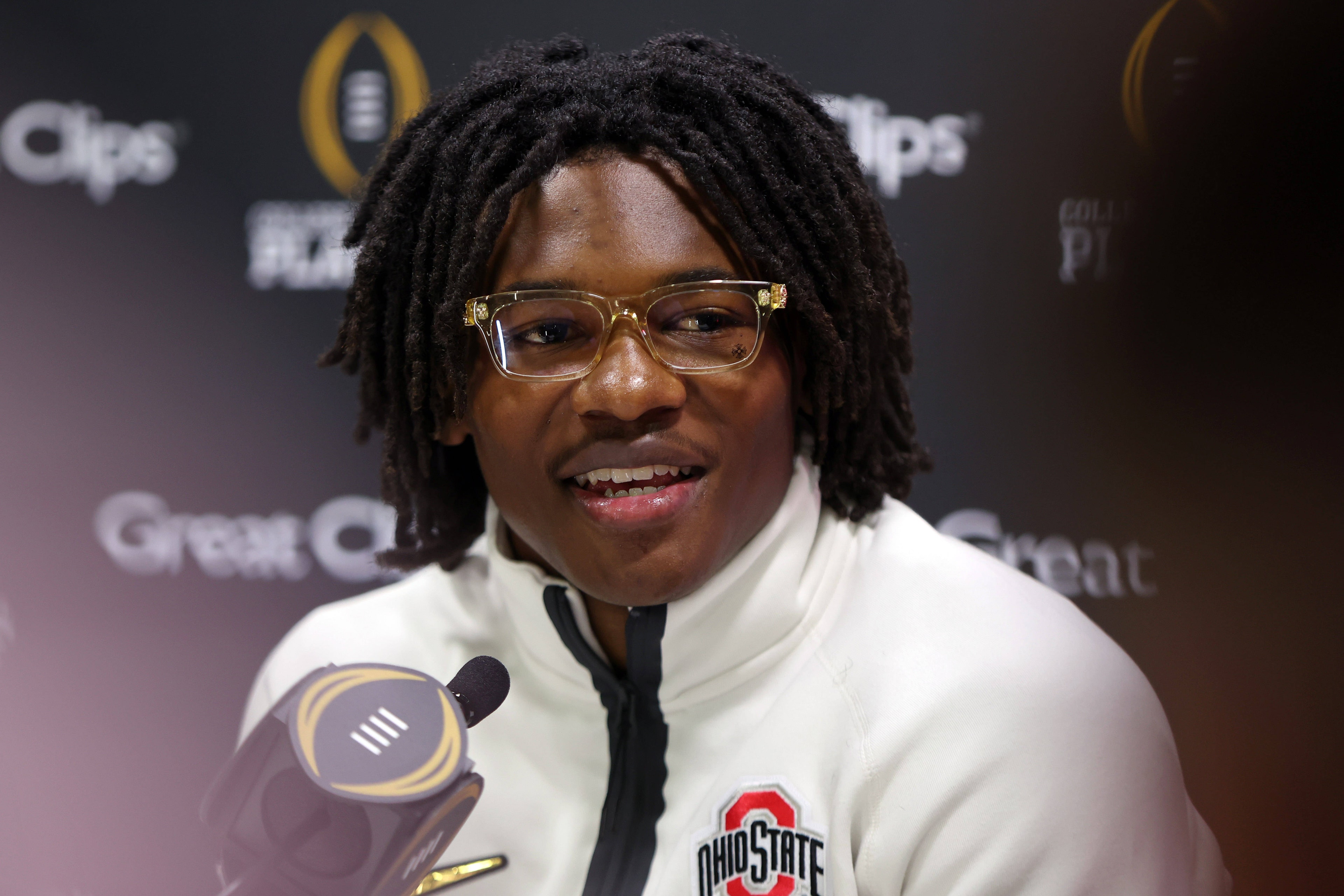 Jeremiah Smith’s long road from youth-team heartbreak to Ohio State captaincy ends with a father’s embrace