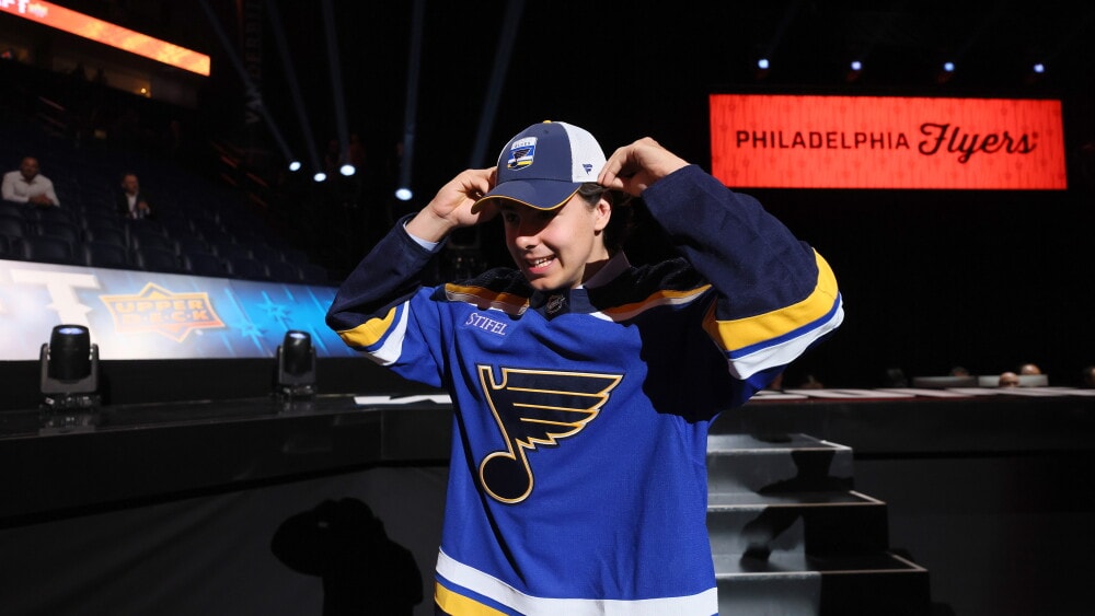 Arizona State defenseman and St. Louis Blues draft pick Matthew Mayich remains hospitalized after collapsing during outdoor workout