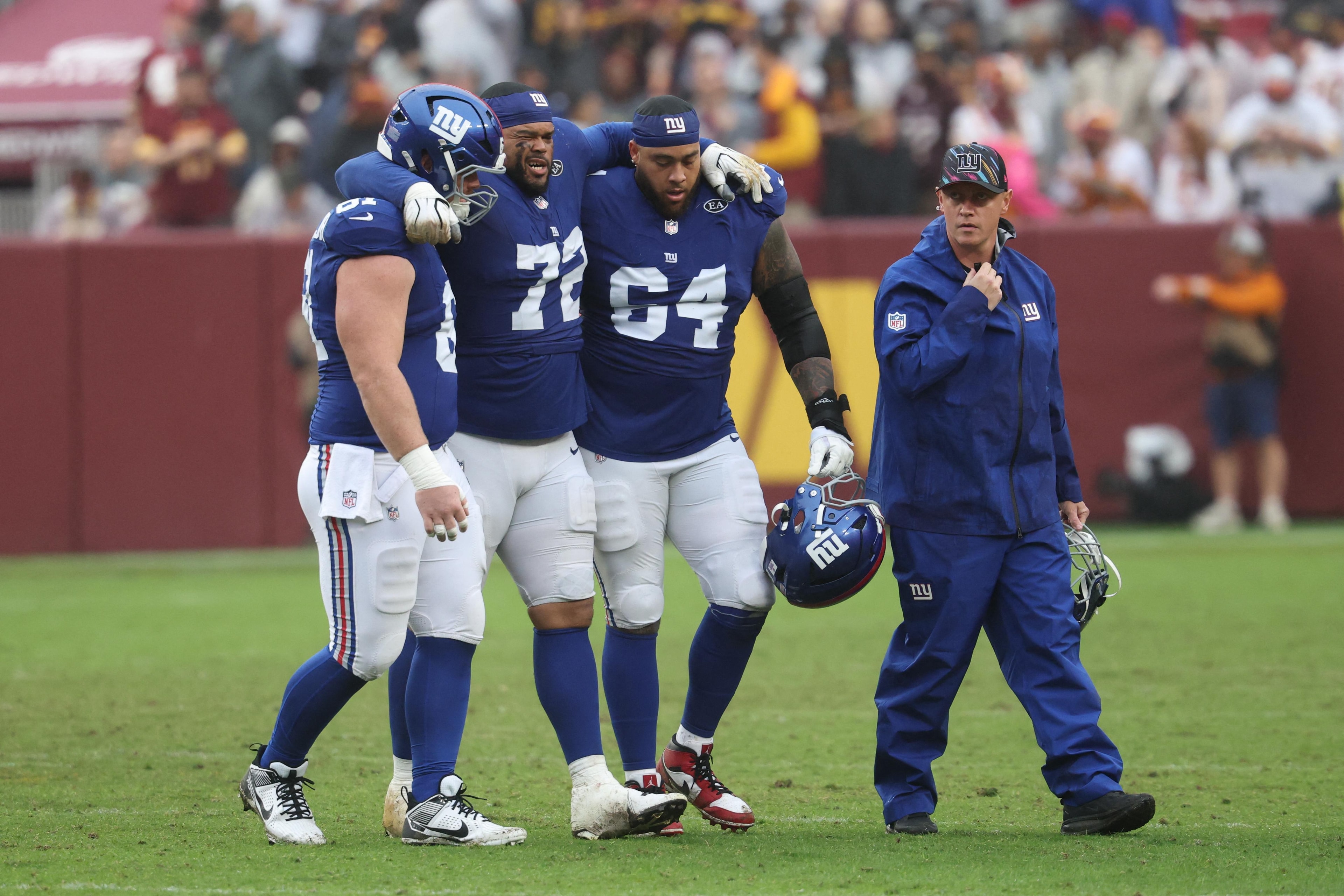 Giants await MRI results after right tackle Jermaine Eluemunor leaves with calf injury in 27-27 tie