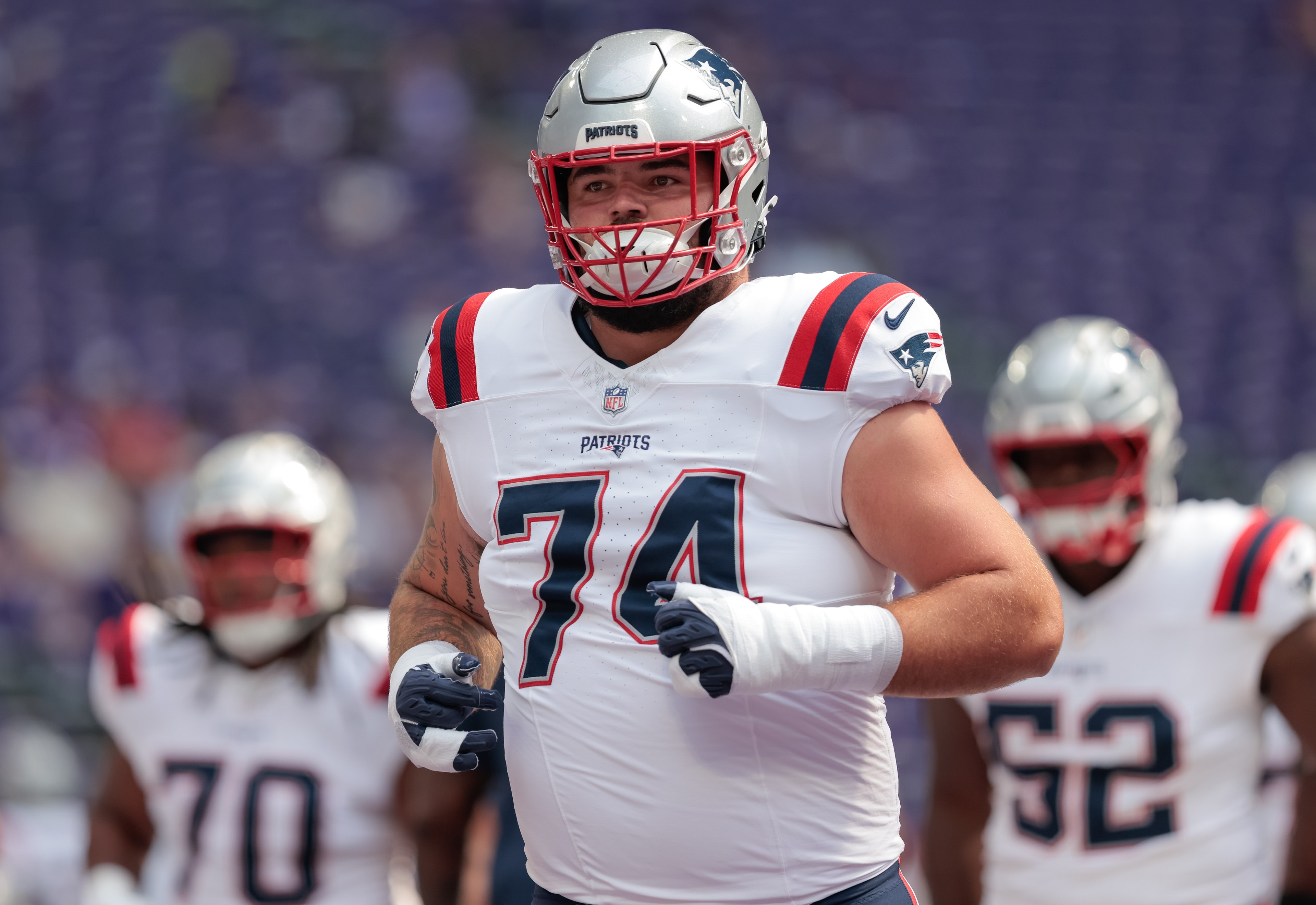Patriots shuffle practice group, add a punter and offensive lineman after preseason setbacks