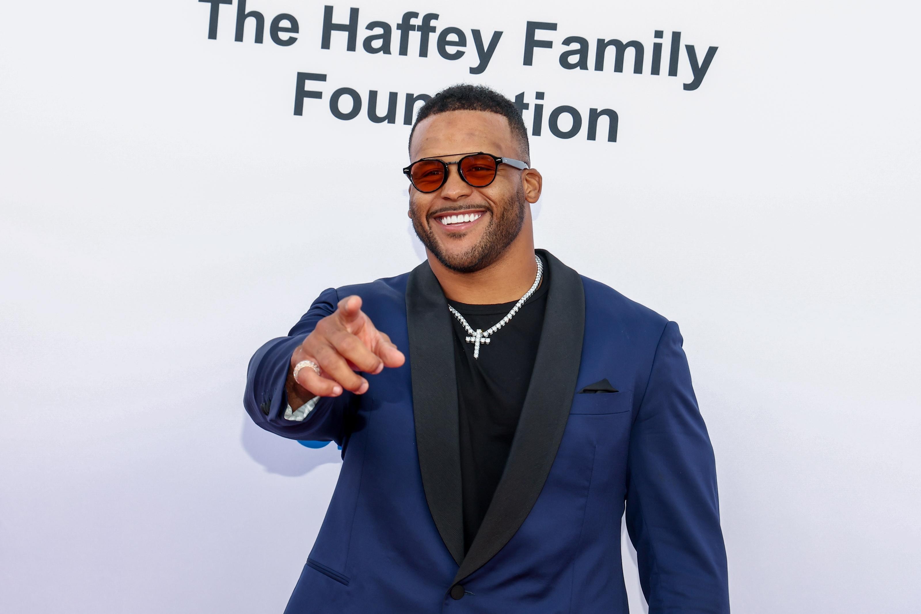 Aaron Donald returns to Los Angeles for another Rams workout as retirement chatter persists