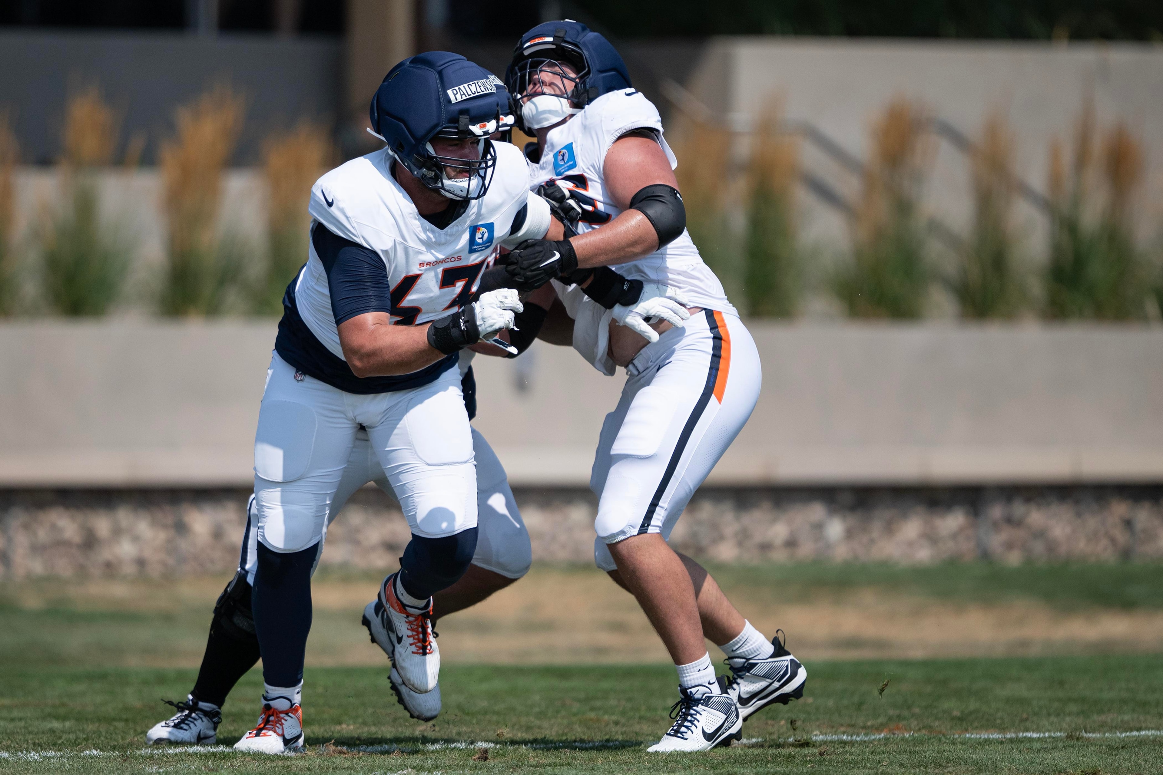 Broncos waive offensive lineman Reid Holskey, continuing reshuffle of the offensive line depth