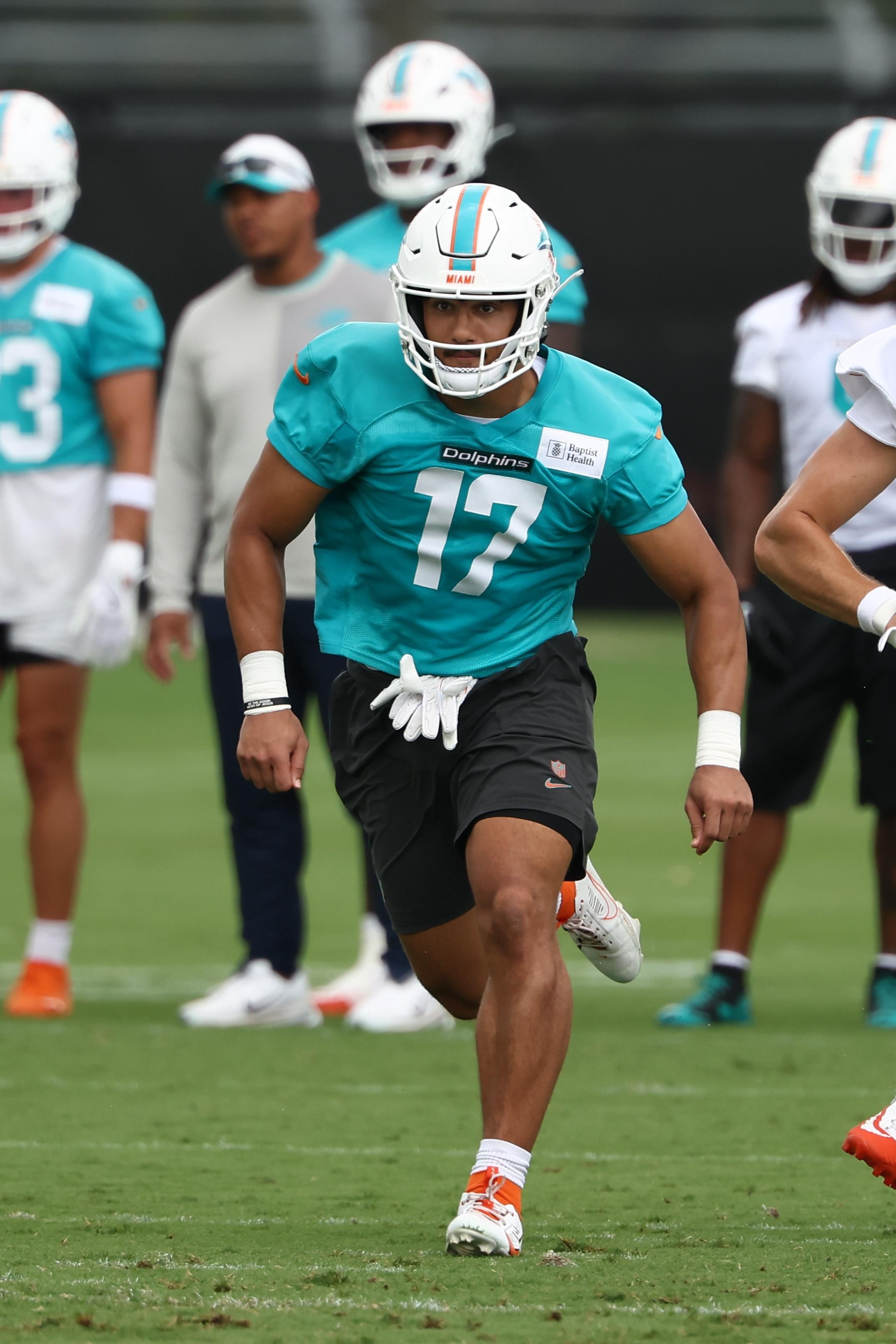Dolphins rookie linebacker Trey Moore leaves preseason game vs. Giants with left leg injury
