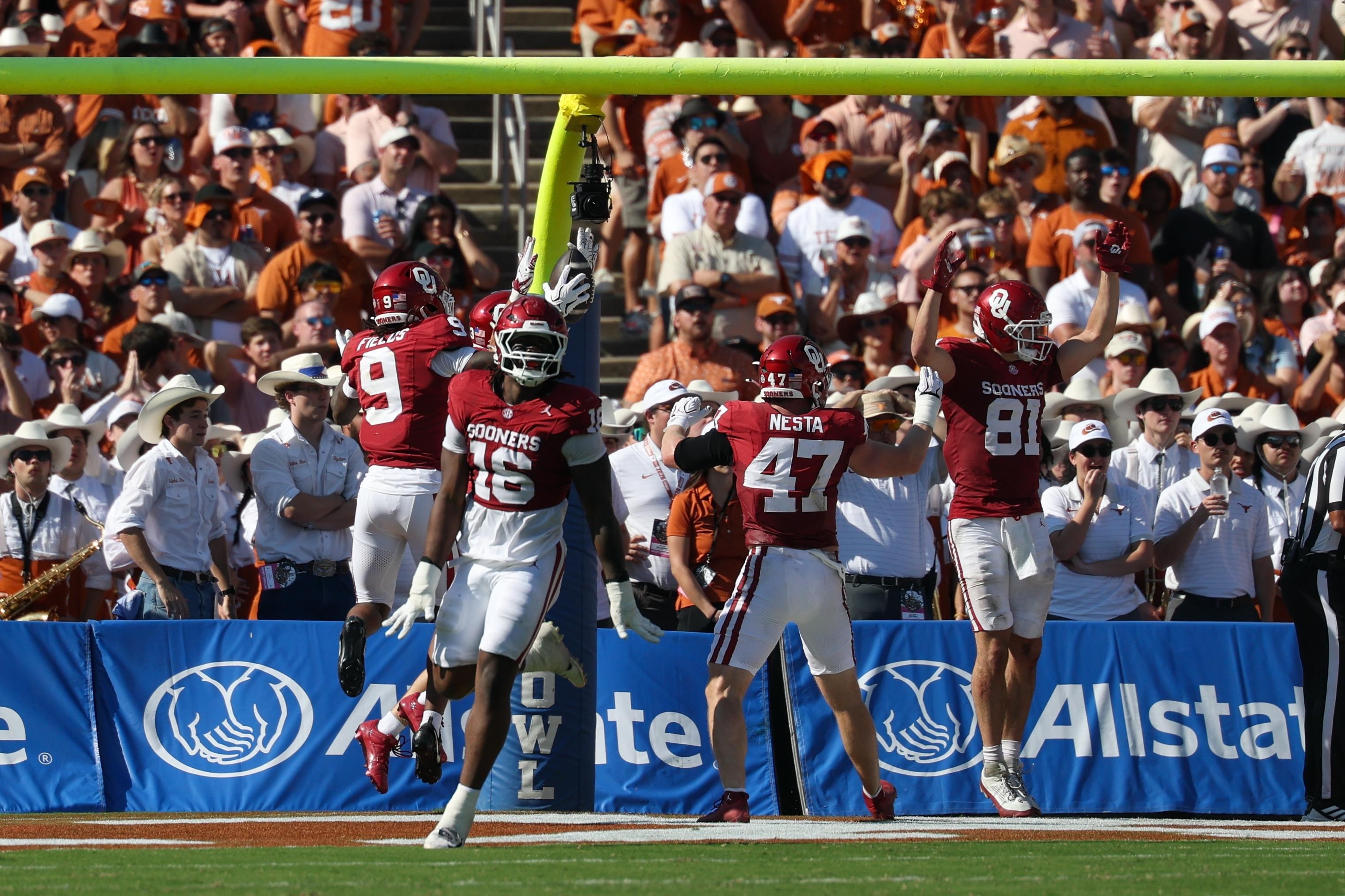 Blocked punt breakdown and a Manning-to-Coleman TD swing momentum in Red River Rivalry