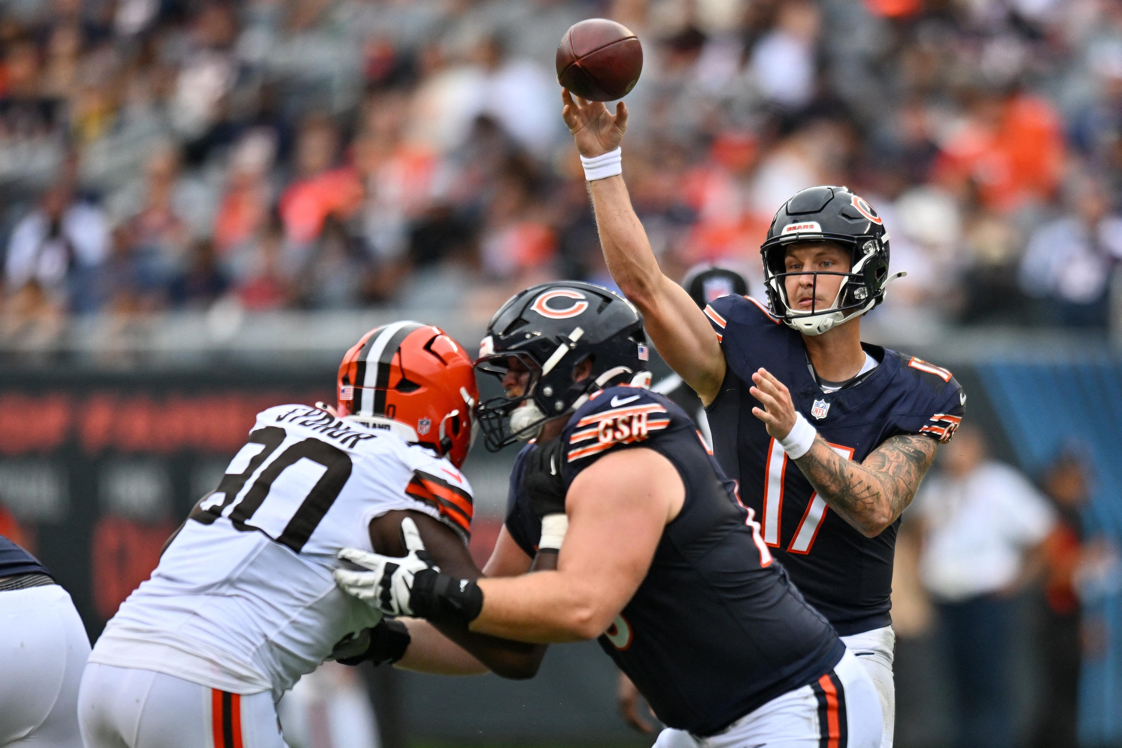 Bears’ quarterbacks connect for 348 yards in preseason opener, but Ben Johnson’s approach draws attention