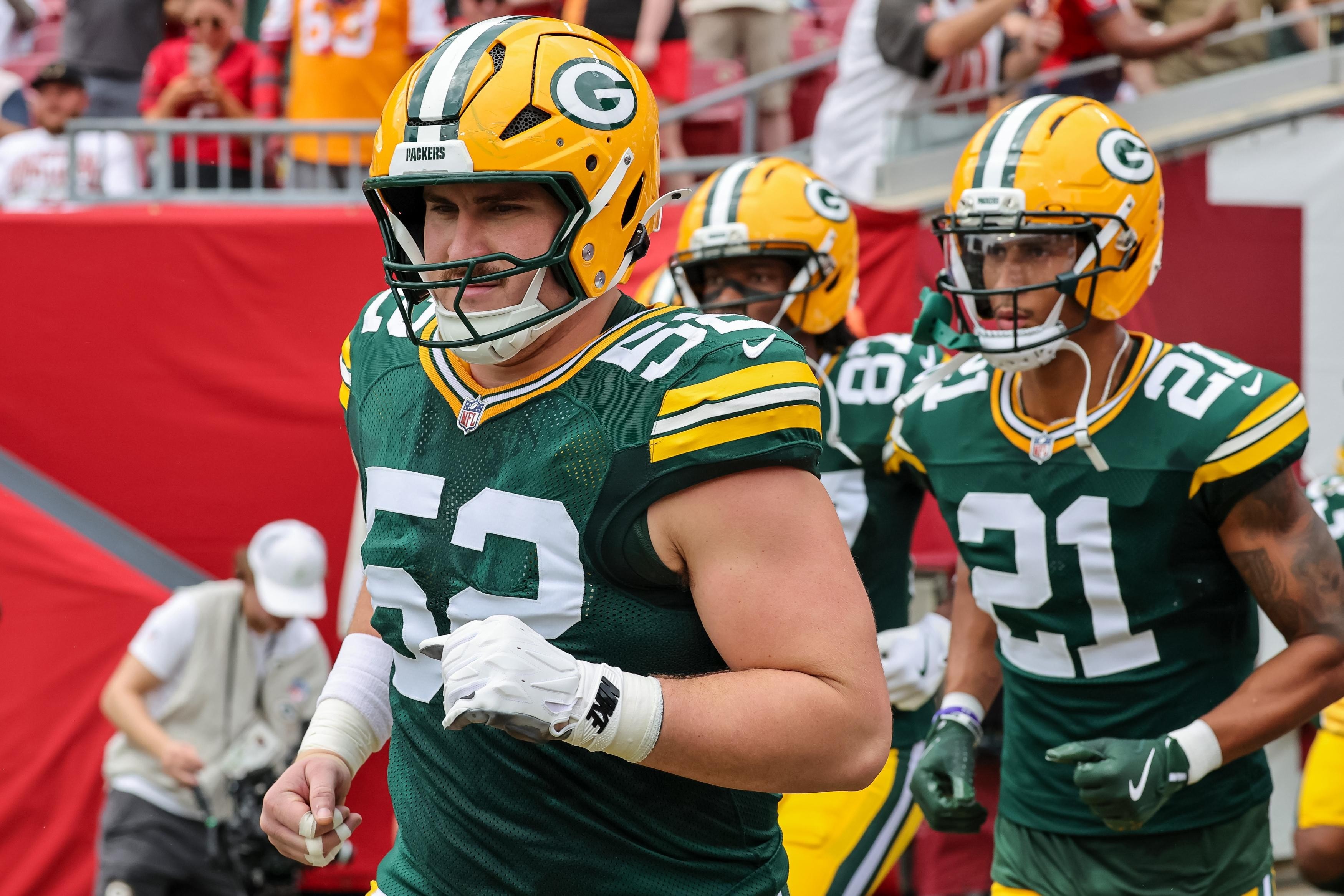 Jager Burton practices in limited return as Packers monitor back spasms