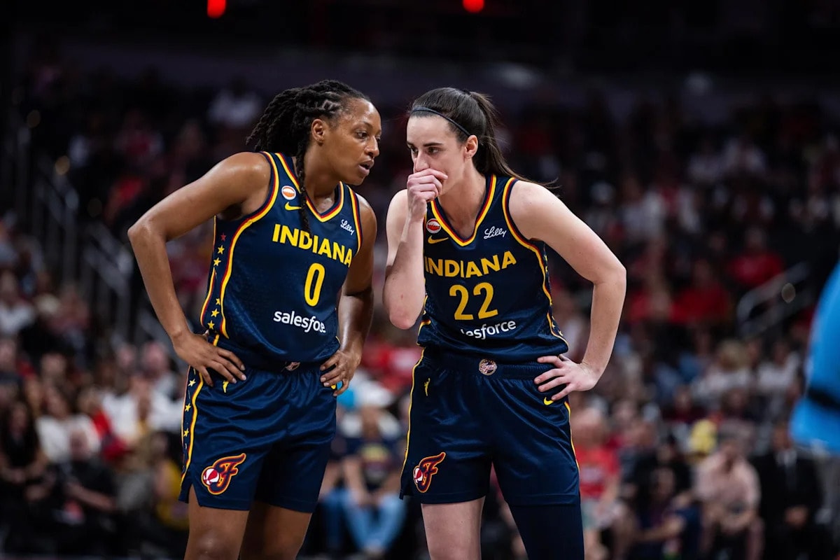 Caitlin Clark and Kelsey Mitchell deliver 34-point pair as Fever beat Sun and make WNBA history