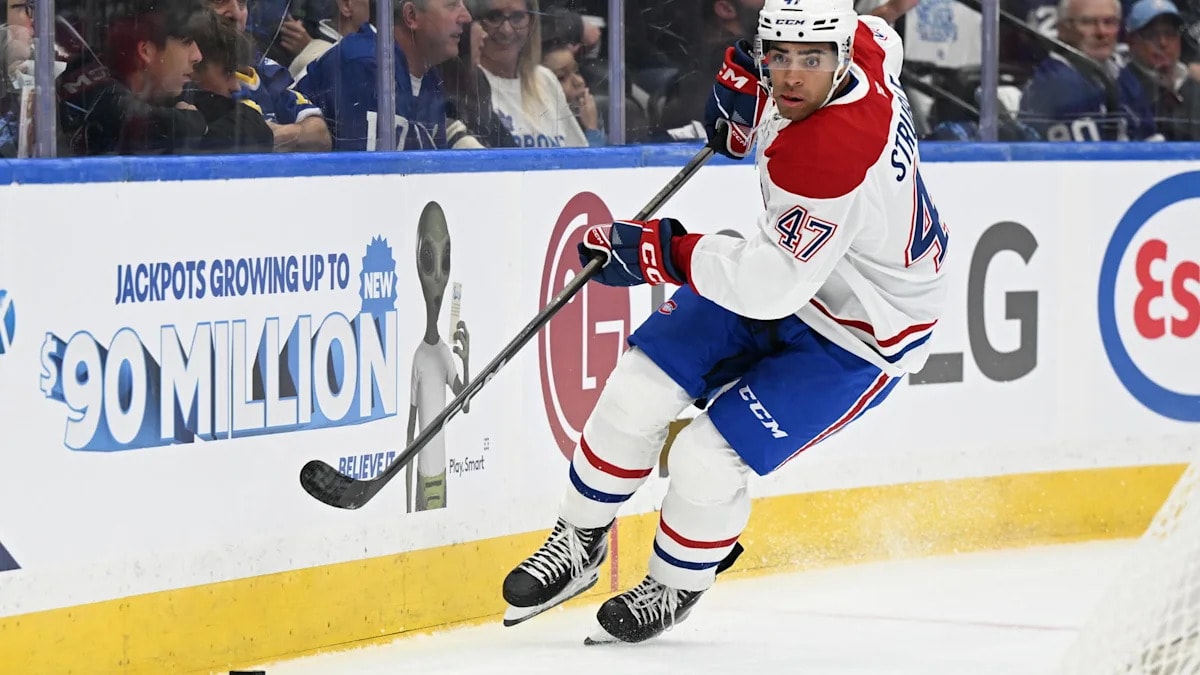 Canadiens’ Kent Hughes makes a move on the left side, sending Jayden Struble to Nashville