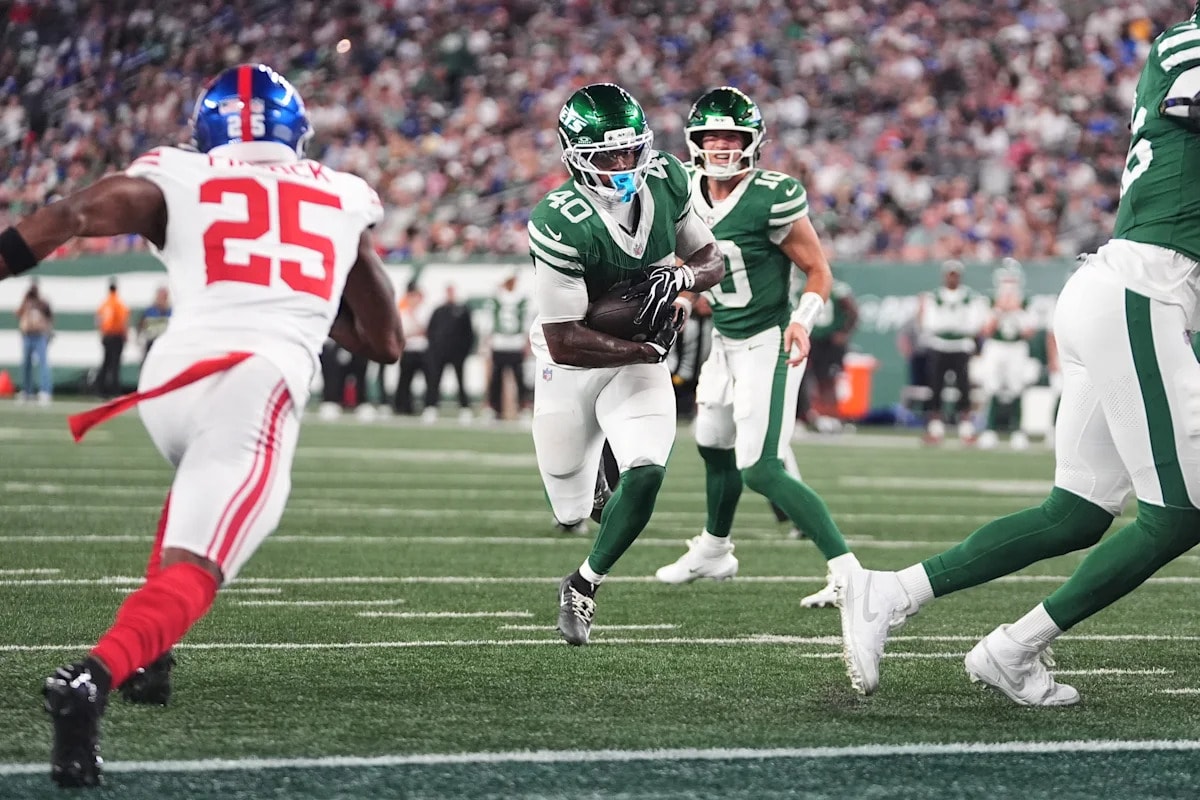 Jets rookie Chip Trayanum taken to hospital after neck injury on tackle vs. Giants