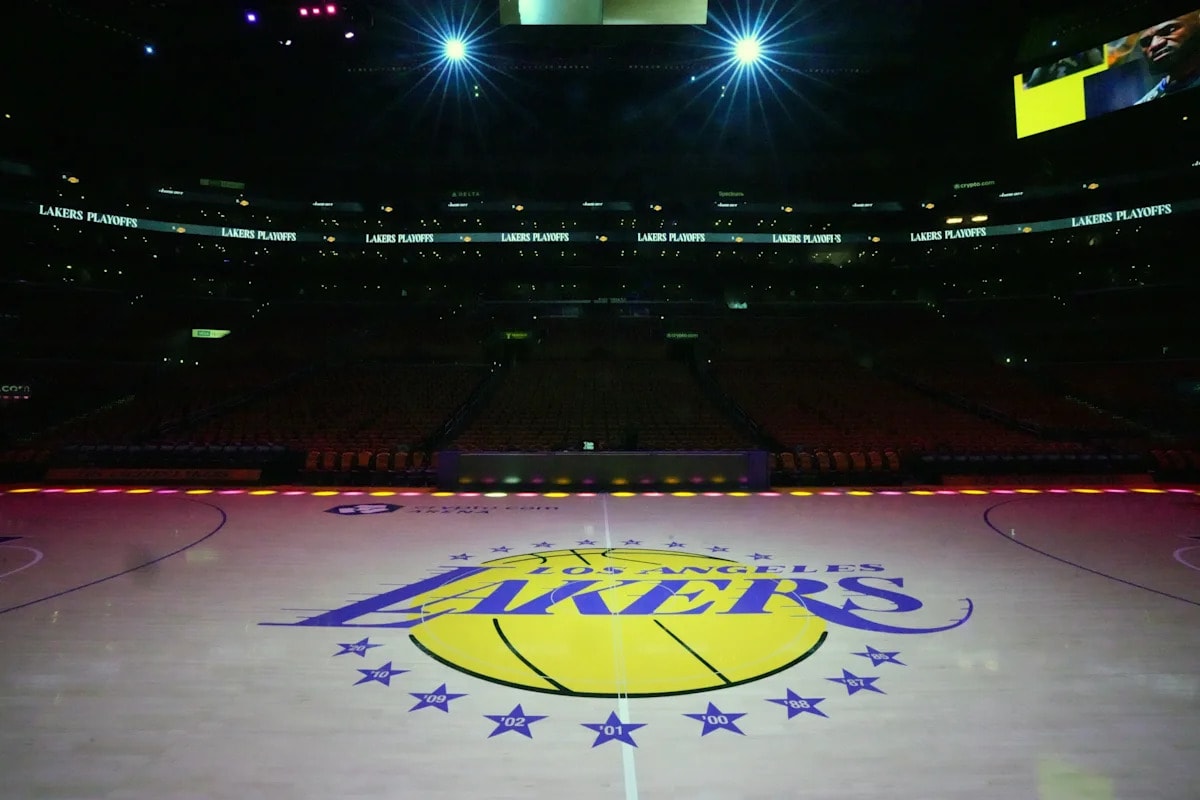 Lakers sale reported at $12 billion, a North American sports-franchise record