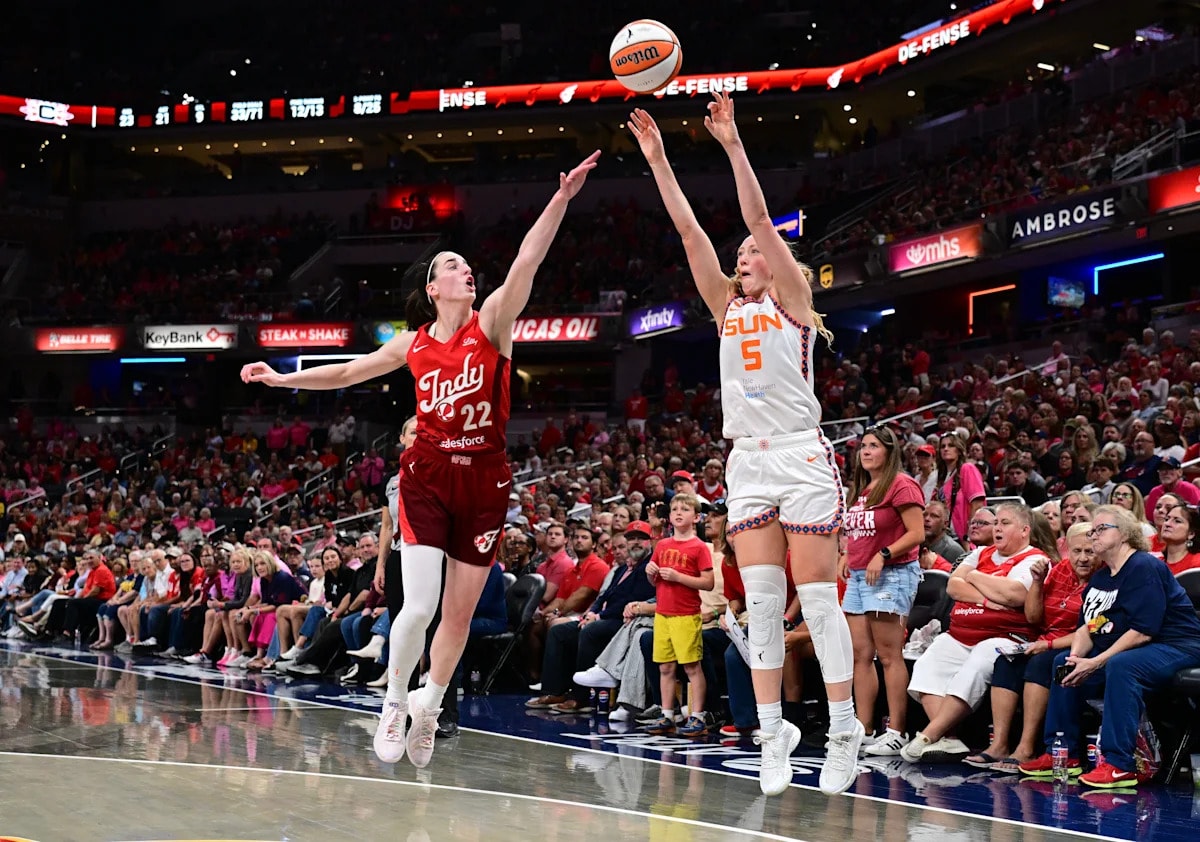 Caitlin Clark and Kelsey Mitchell each score 34 as Fever erase early deficit, beat the Sun 111-91