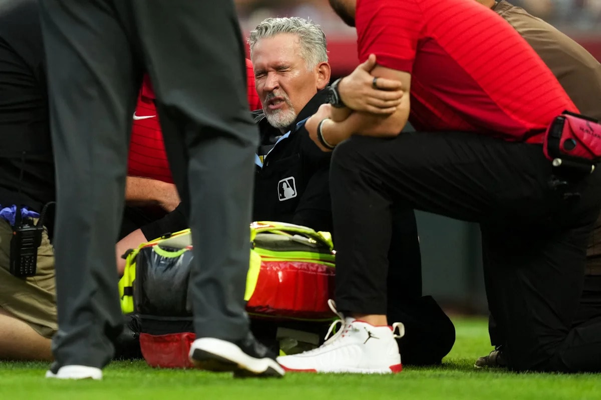 Umpire Manny Gonzalez leaves Reds-Padres game with reported heat illness after blurry vision behind the plate