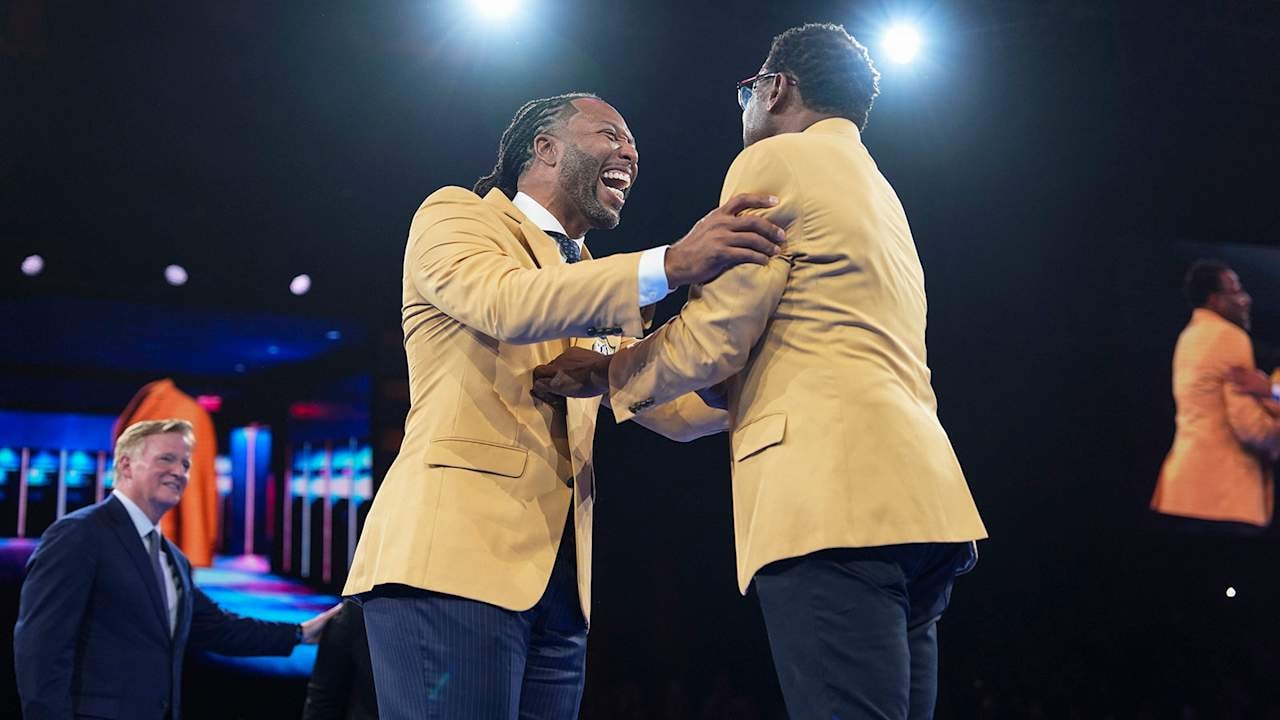 Larry Fitzgerald wears the Gold Jacket as he nears Pro Football Hall of Fame induction