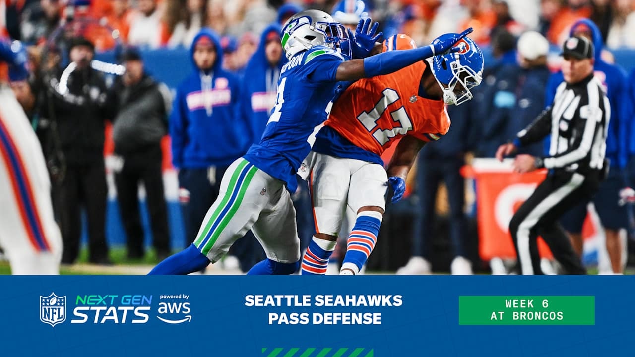 How did Seattle’s defense keep the passing game under control in overtime at Denver?