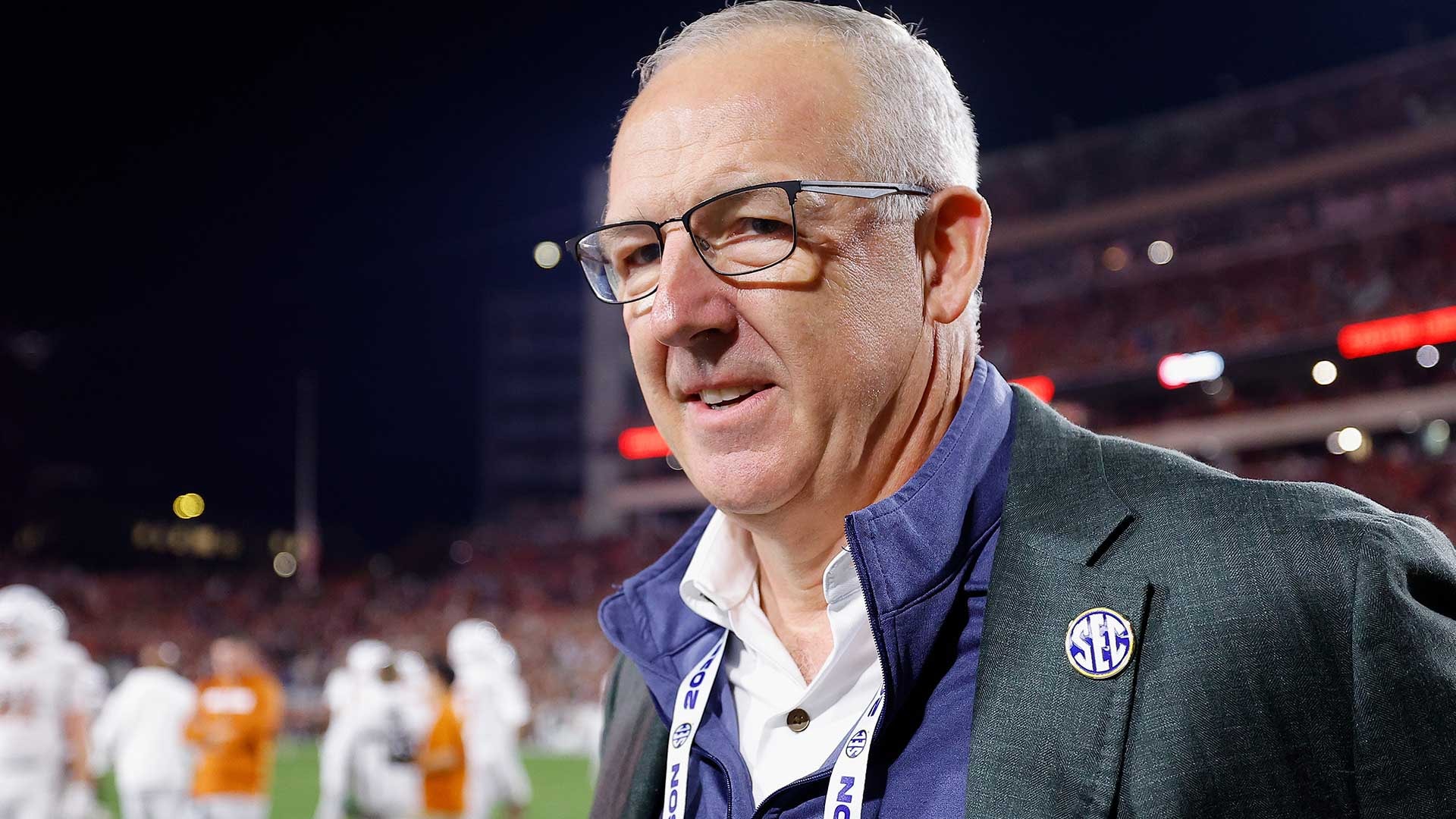 College football leaders gather in Denver to debate 16- vs. 24-team playoff expansion